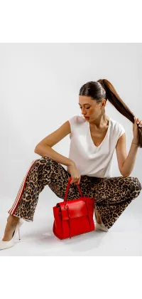 Джинси вільного крою з леопардовим принтом і додатковими червоними та білими смужками від французьких виробників з високою посадкою., одяг від Jador