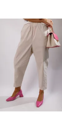 Кремові котонові штани. Колір: 