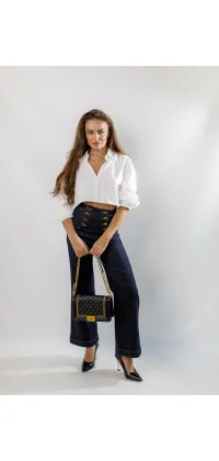 Джинси з золотим декором. Ціна: 4990 грн