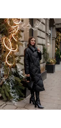 Подовжений пуховик. Доступні розміри: S, L