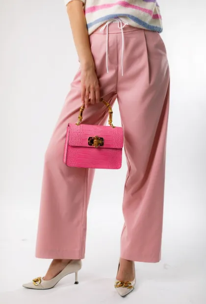 Рожеві штани з вставкою