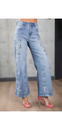 Джинси з квітковою вишивкою. Доступні розміри: 
