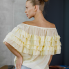 Елегантна блуза з воланами