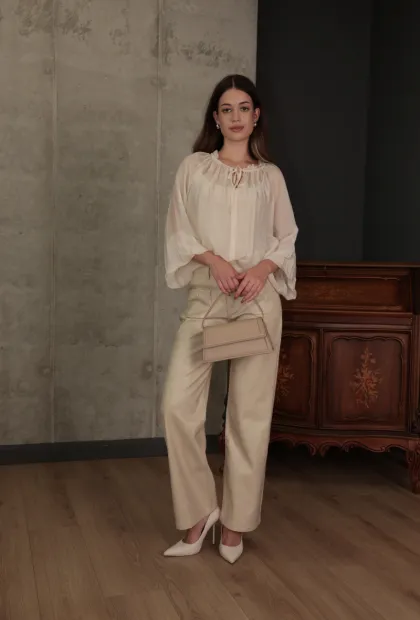 Блуза з шифонової тканини