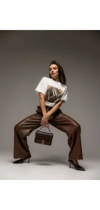 Стильні шкіряні штани. Колір: Коричневий