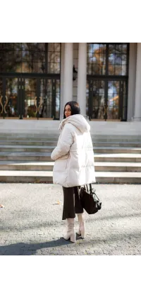 Подовжений зимовий пуховик. Ціна: 13990 грн