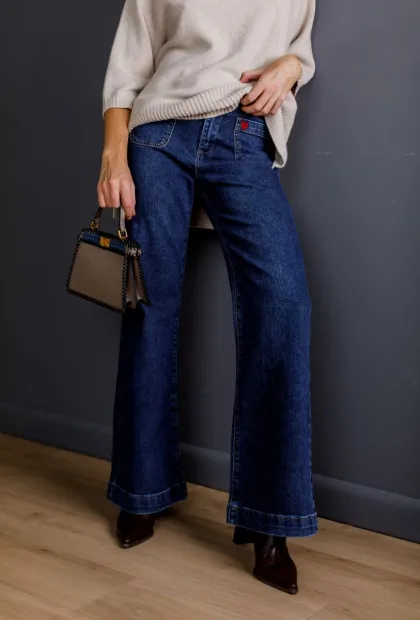 Темно-сині джинси-кльош з високою посадкою
