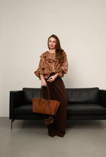 Блуза з воланами