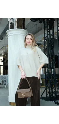 Сумка  з металевою застібкою у стилі Coach, одяг від Jador