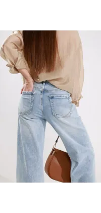 Світлі джинси wide leg, одяг від Jador