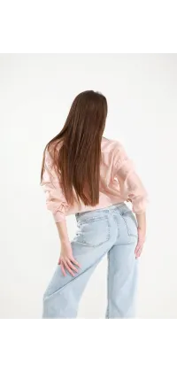 Світлі джинси, одяг від Jador