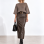 Вишукана спідниця міді з акцентним поясом