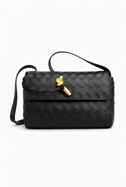 Плетена шкіряна сумка з декоративною застібкою