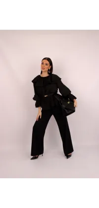 Чорна блуза з воланами, одяг від Jador