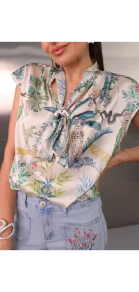 Блуза з принтом та бантом. Колір: Біло-зелений