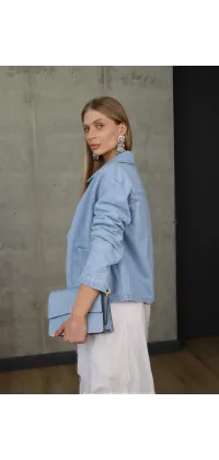 Стильна джинсова куртка у блакитному відтінку. Доступні розміри: S/M, M/L