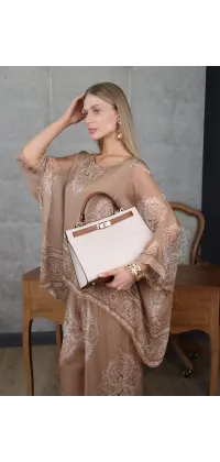 Вишуканий жіночий костюм, одяг від Jador