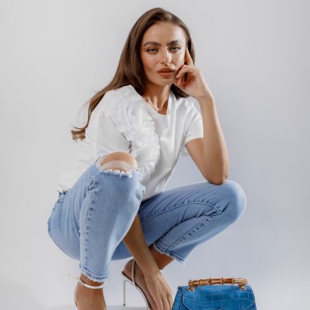 фото: Класичні французькі джинси skinny з високою посадкою та розрізом на коліні, одяг від Jador