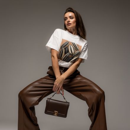 Жіночі штани з еко-шкіри з ременем, колір 